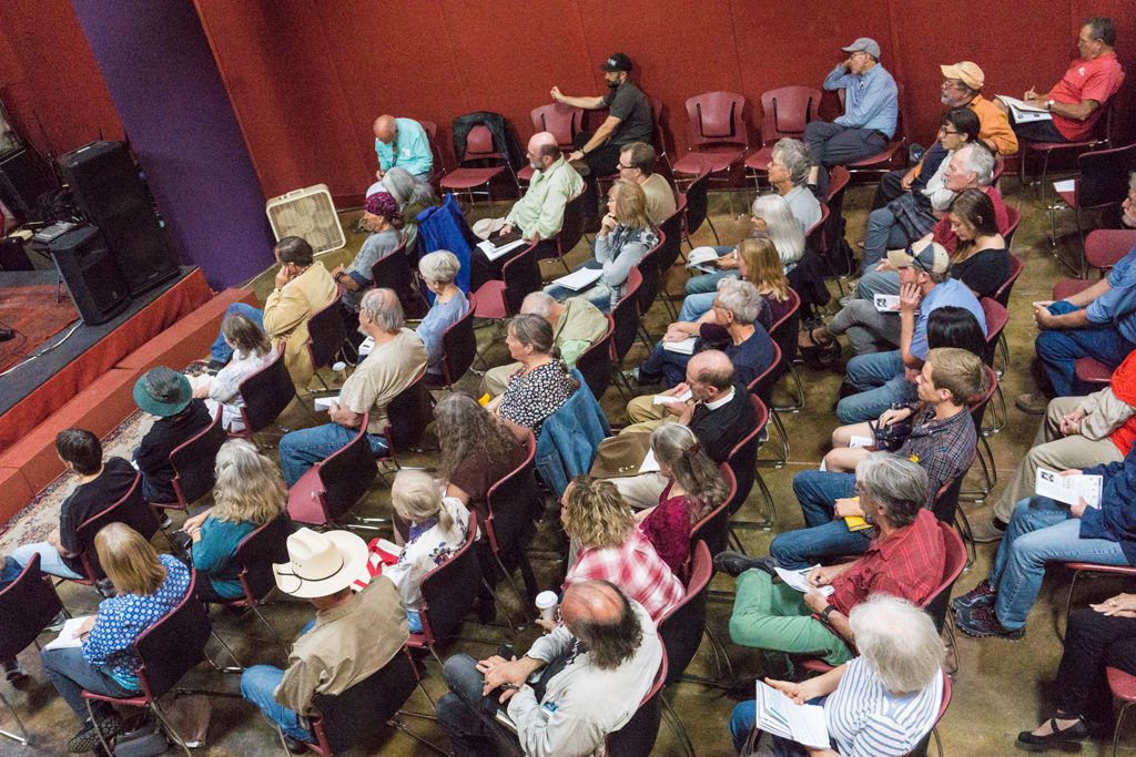 photo viewed from above, showing audience members at a Festival event